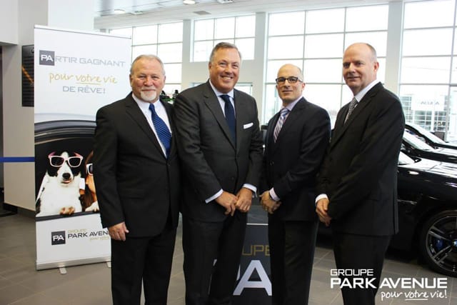 Pierre Simoneau, fondateur de BMW Suprem, Norman Hébert, président et chef de la direction du Groupe Park Avenue, Yves Le Bolloch, vice-président et directeur général de BMW Sherbrooke, et Mario Couturier, directeur chez BMW Canada.